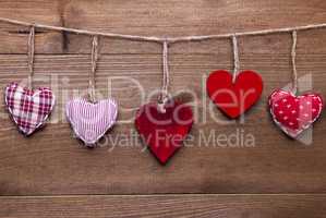 Red Hearts Hanging In A Line For Valentines Daecoration