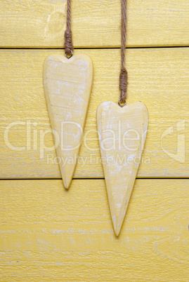 Two Hearts With Copy Space, Yellow Wooden Background, Vertical Image