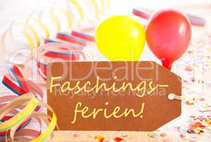 Label, Streamer, Balloon, Yellow Text Faschingsferien Means Carnival Vacation