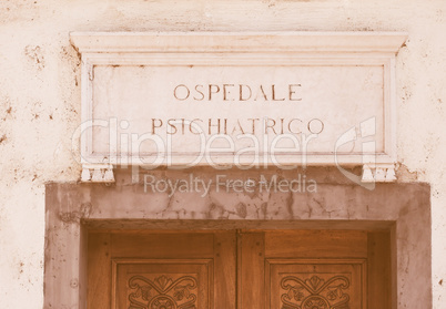 Retro looking Italian mental hospital sign