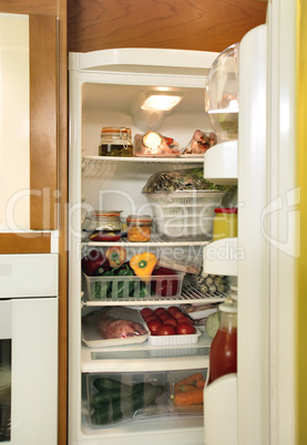 Refrigerator full with some kinds of food