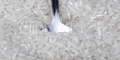 rice background and teaspoon