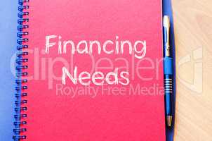 Financing needs write on notebook