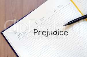 Prejudice write on notebook
