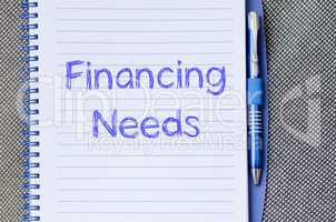 Financing needs write on notebook