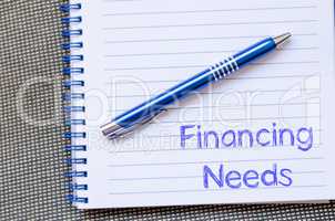 Financing needs write on notebook