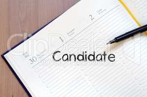 Candidate write on notebook