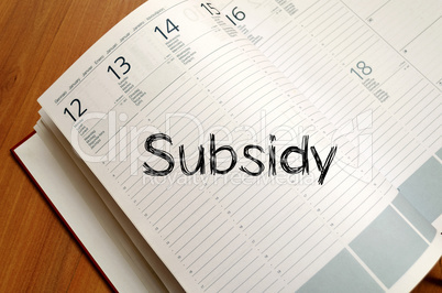 Subsidy write on notebook