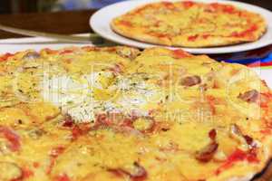 tasty pizza cooked in pizzeria