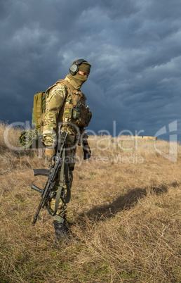 Soldier with a gun in the medical field