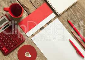 The mockup on wooden background with red calculator
