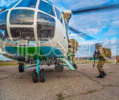 Odessa, Ukraine - December 02, 2015: Soldiers loaded into the helicopter