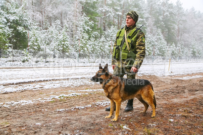 Border dog with a soldier