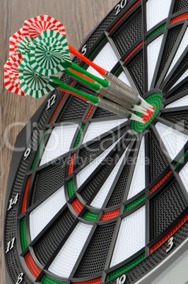 Dart board with darts