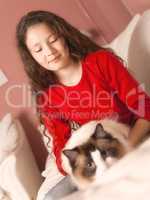 young girl with her cat