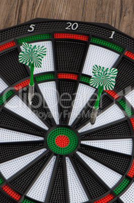 Dart board with darts