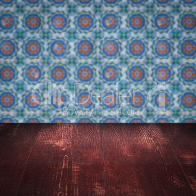 Wood table top and blur vintage ceramic tile pattern wall