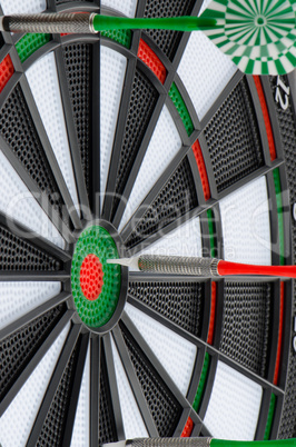 Dart board with darts