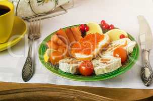 Snacks with fish and black coffee.