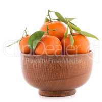 Tangerines on wooden  bowl