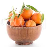 Tangerines on wooden  bowl