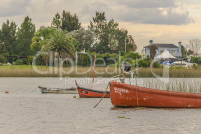 Fishing and Sailboats at Santa Lucia River in Montevideo