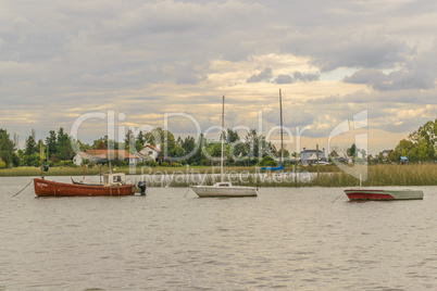 Fishing and Sailboats at Santa Lucia River in Montevideo