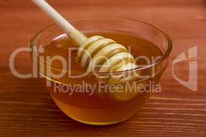 Wooden honey stick to extract honey