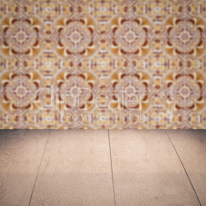 Wood table top and blur vintage ceramic tile pattern wall