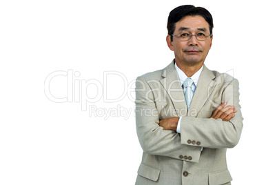 Serious businessman smiling