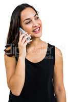 Happy beautiful woman talking on phone