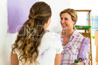 Mother and daughter looking at each other