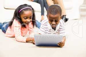Happy kids using tablet pc