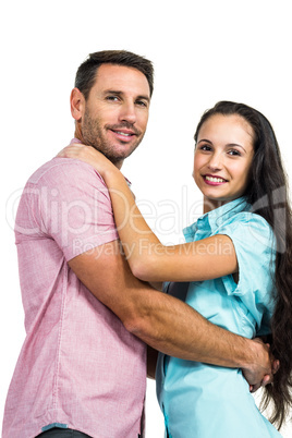 Portrait of smiling couple hugging