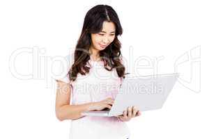 Happy woman using laptop