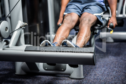 Cropped image of man using exercise machine