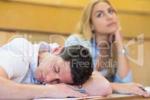 Male students falling asleep during clas