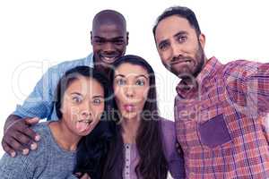 Happy multi-ethnic friends making a face