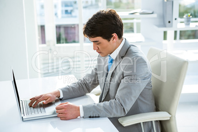 Asian businessman using his computer