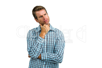 Thoughtful man with hand on chin