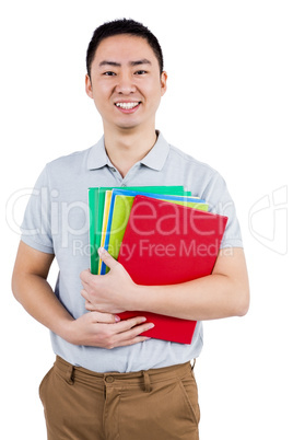 Smiling man holding files