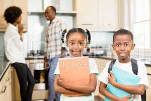 Cute siblings ready for school