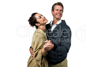 Cheerful romantic couple dancing