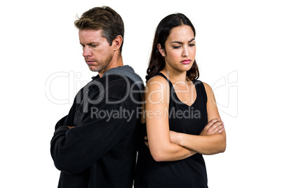 Angry couple standing over white background