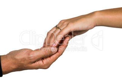 Cropped hand of couple holding hands