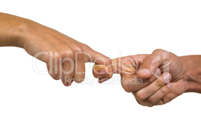 Cropped image of people holding fingers