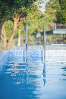 Outdoor swimming pool with shiny water