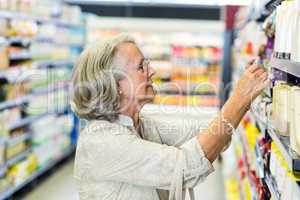 Senior woman buying food