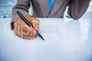 Serious businessman on his desk