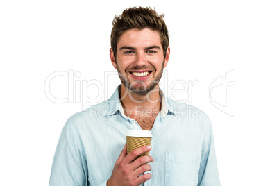 Smiling man with disposable cup